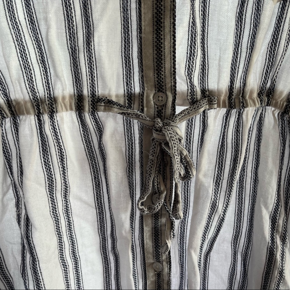 White dress with blue stripped pattern